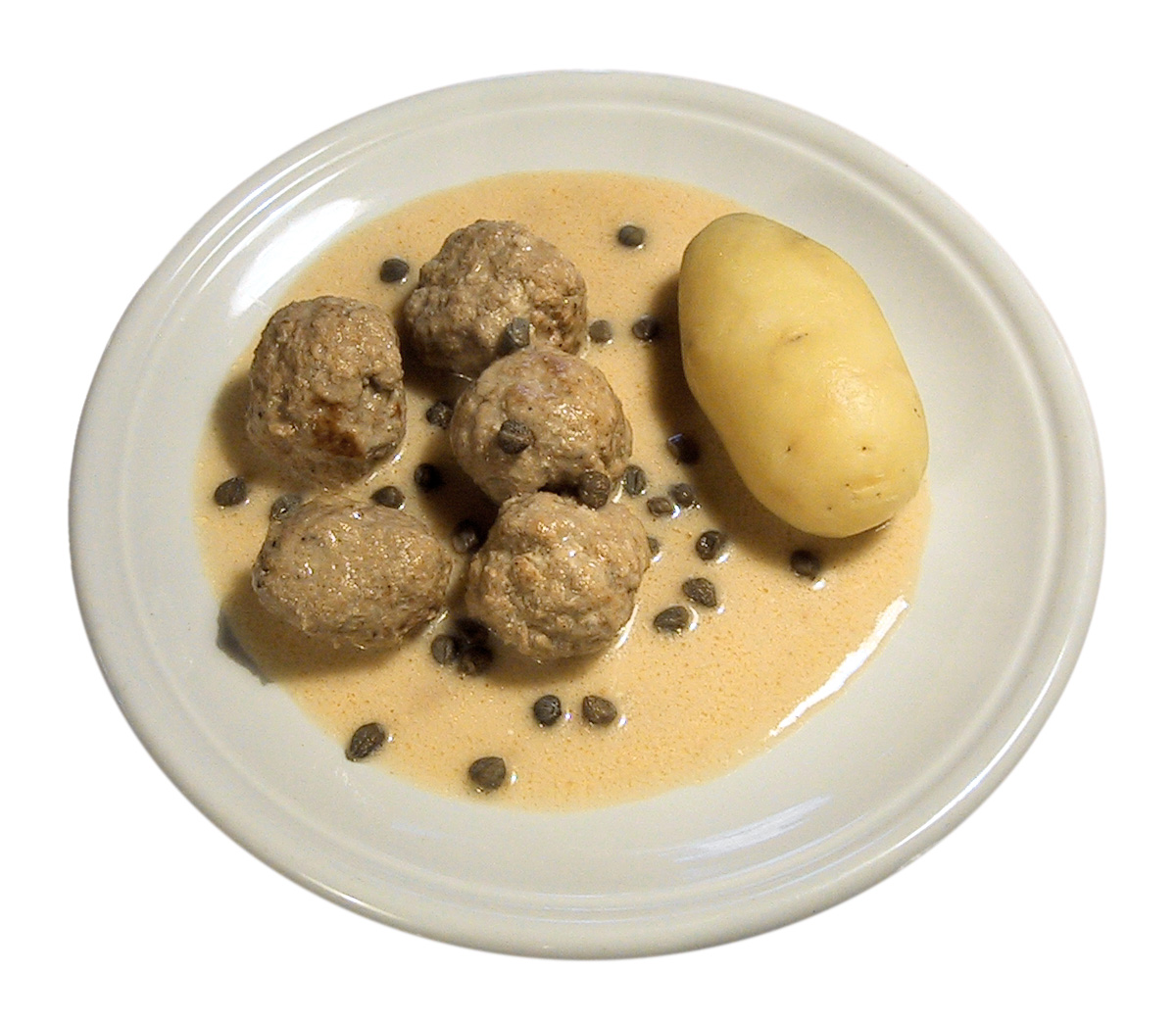 ケッパー入りのソースに入った肉団子